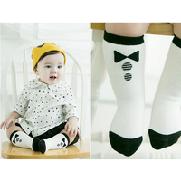 15新款韩版可爱领结宝宝纯棉袜子防滑地板袜儿童蝴蝶结中筒袜