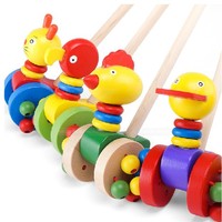 儿童益智玩具新款鸭子车 卡通动物推车木制单杆手推车学步发声车