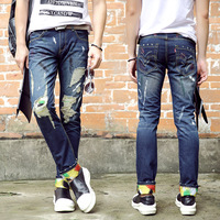 青少年牛仔裤秋季男款大码破洞长裤子小脚修身直筒韩版个性新潮流
